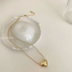 Anthropologie Gold Heart Necklace